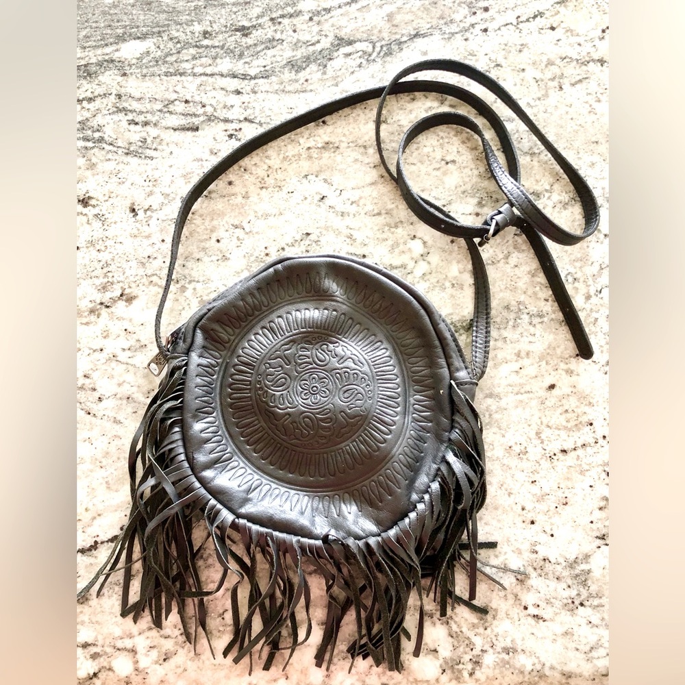 Patricia Nash Black leather fringe crossbody bag. Used, very good condition.